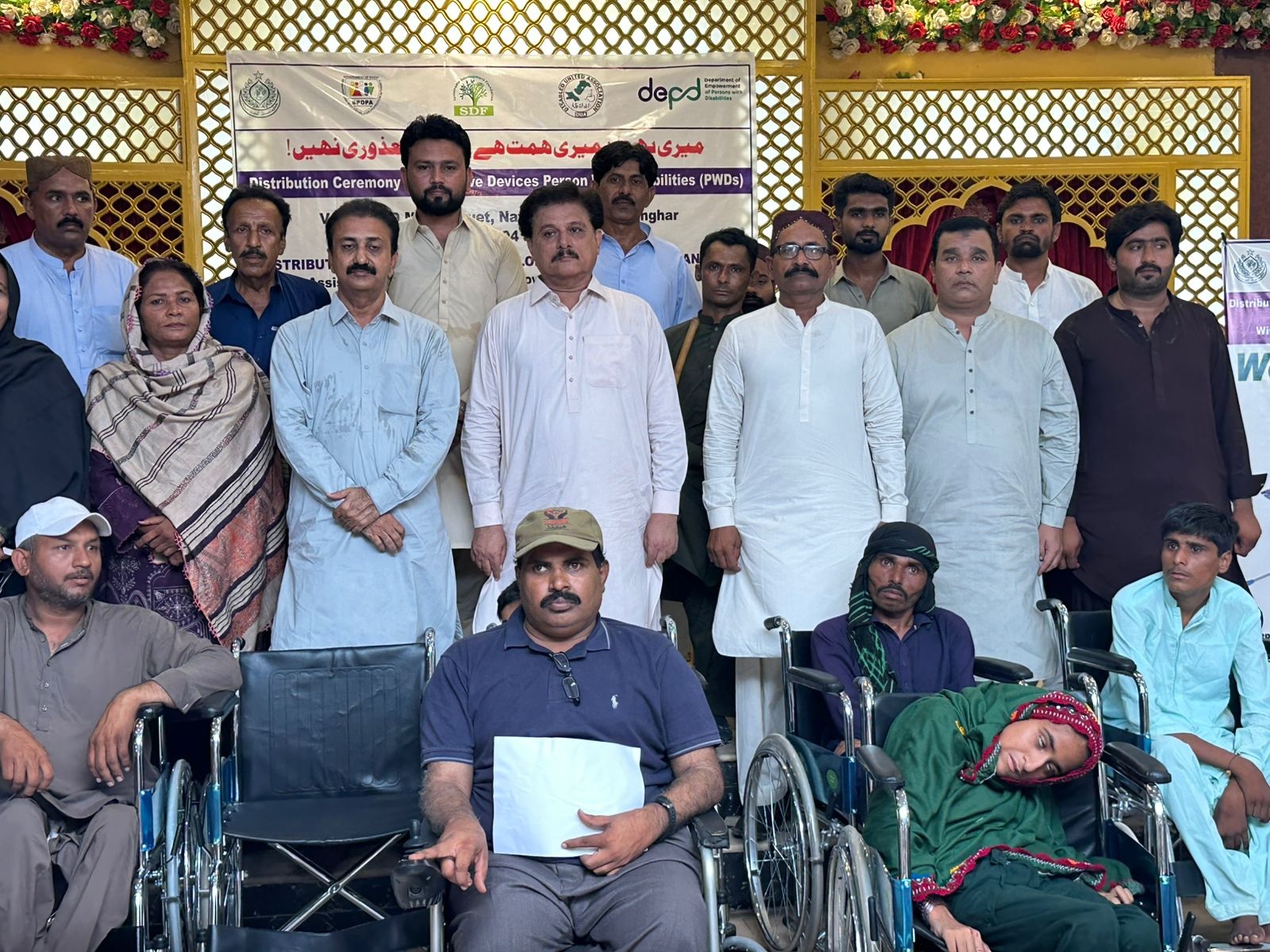 Assistive devices distributed among persons with disabilities in Sanghar on International Assistive Devices Day